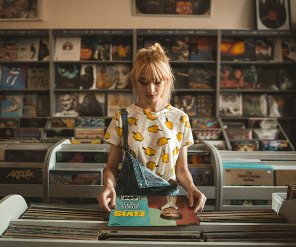 woman in record store